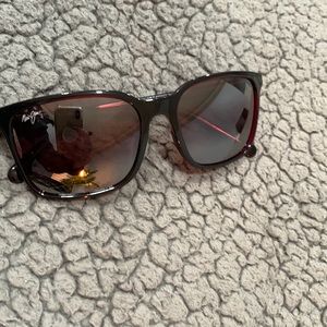 Never worn Maui Jim Polarized Sunglasses. Excellent condition.